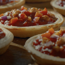 Piccolinis pizzas steaming in the oven